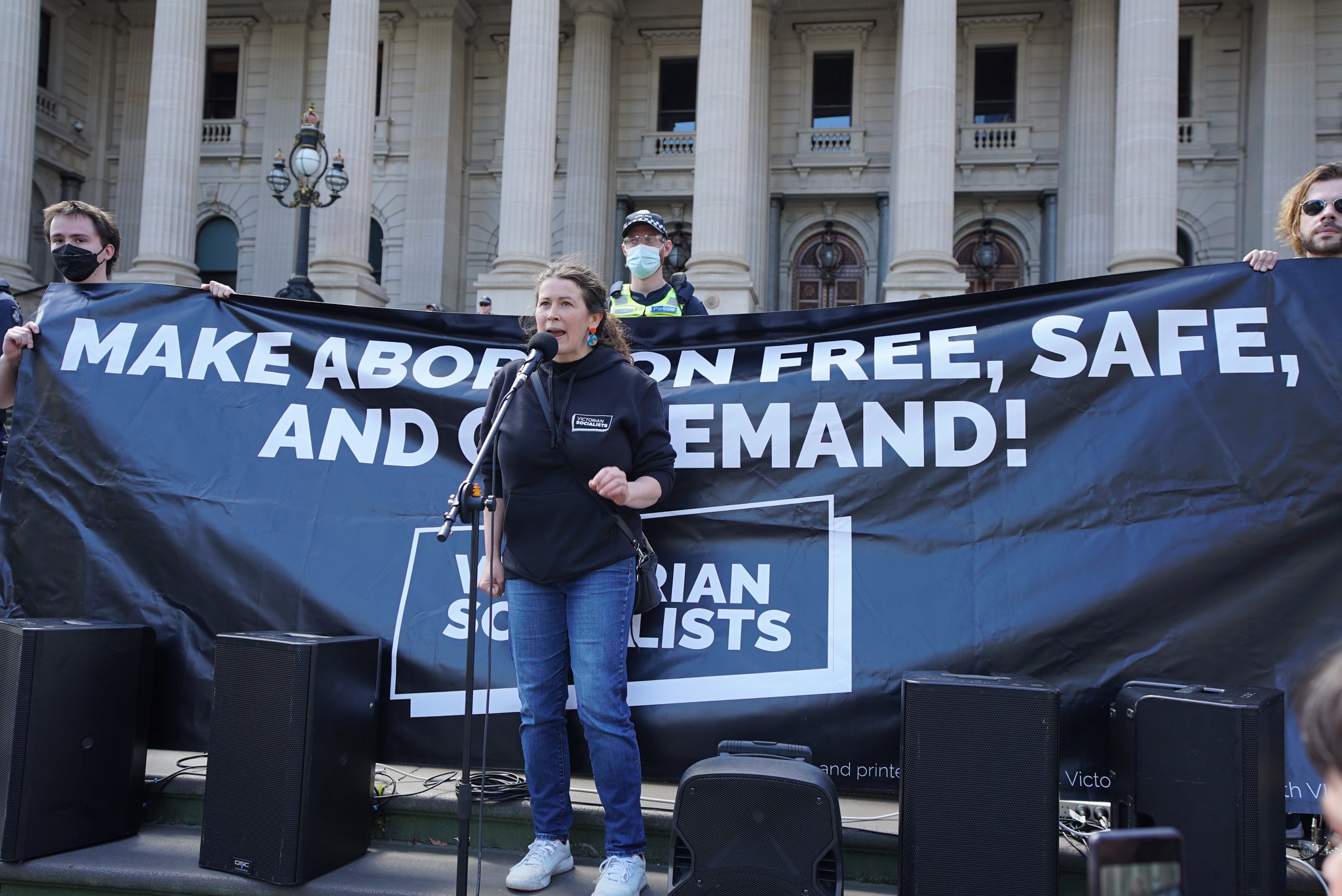 Liz Walsh speaks at the rally